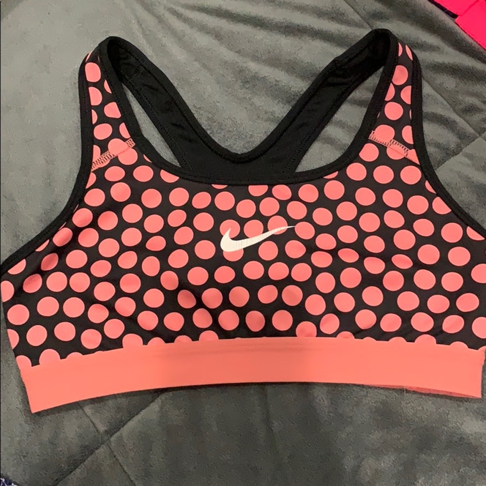 Lightly used pink and black Nike sports bra